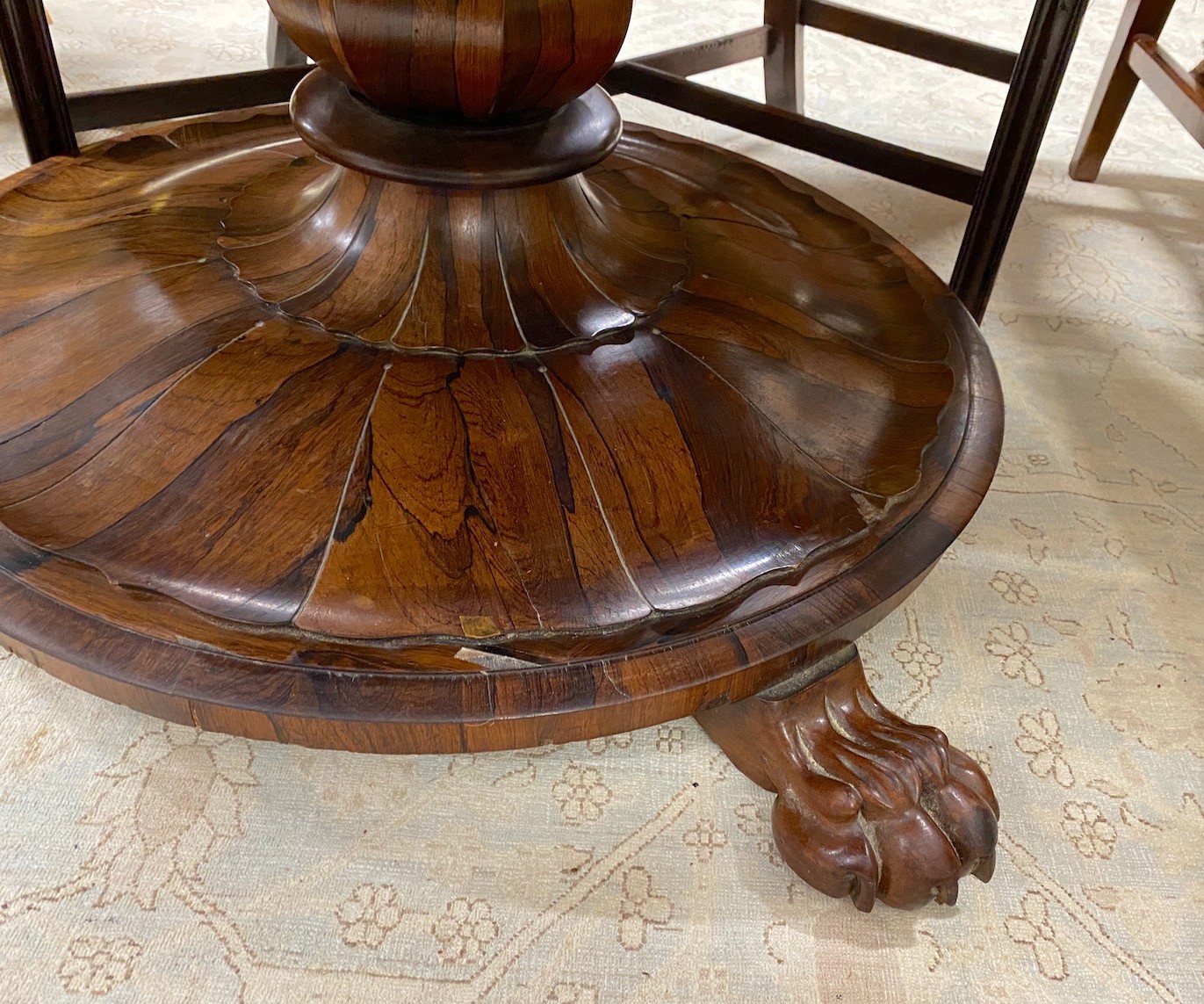 An early Victorian circular rosewood tilt top breakfast table, diameter 130cm, height 70cm
